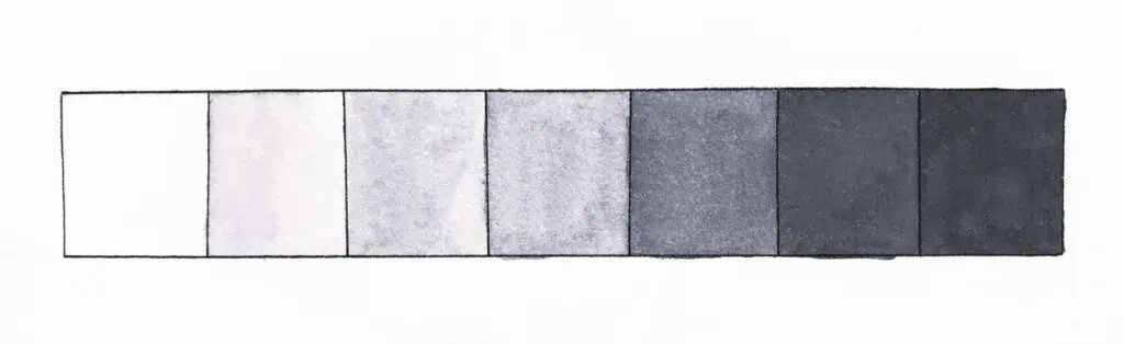There is an image of watercolor value scales in the color gray. There are seven boxes on the scale. The first box on the left is white and the scale transitions to black in the seventh box on the right.